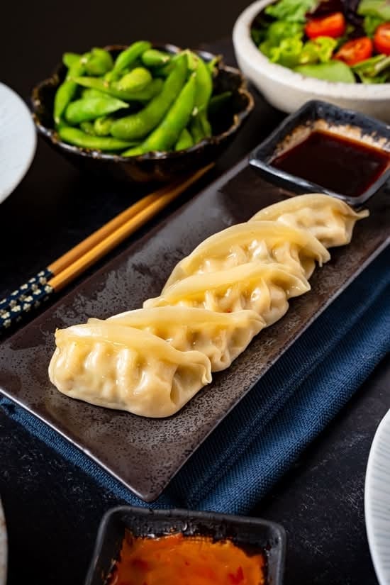 Pan fried pork gyoza catering.